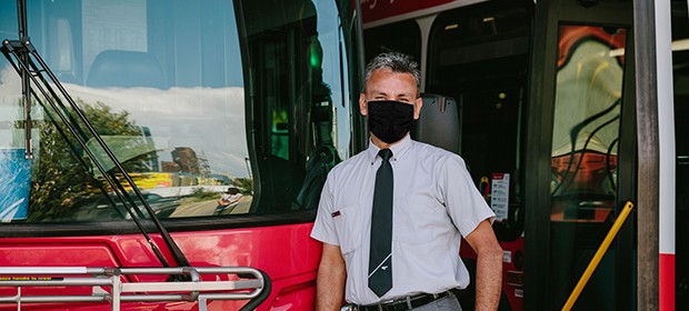 Calgary Transit bus driver wearing a mask